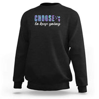 Black crewneck sweatshirt with front “choose to keep going” colorful graphic print.