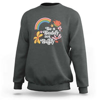 Dark heather crewneck sweatshirt with rainbow and 'Be a Buddy not a Bully' floral graphic
