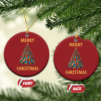 Set of two red round Christmas ornaments with tree graphic and gold "Merry Christmas" text