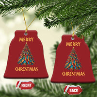 Red bell-shaped Christmas ornament with colorful tree graphic and gold "Merry Christmas" text