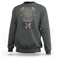 Charcoal veteran's day sweatshirt with graphic text and American flag boots on chest