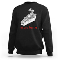 Black skeleton graphic sweatshirt with coffin illustration and red “never better” text