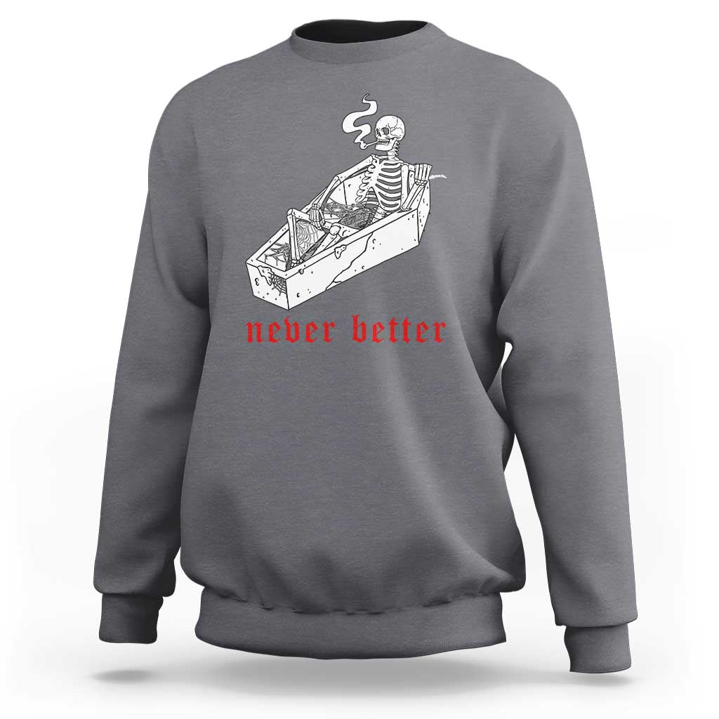 Charcoal gray skeleton graphic sweatshirt with coffin illustration and red “never better” text