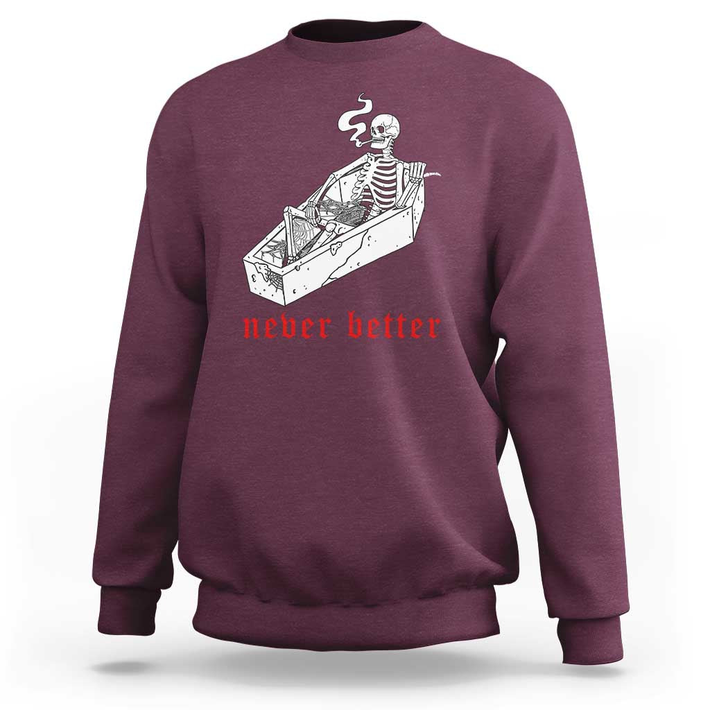 Maroon skeleton graphic sweatshirt with coffin illustration and red “never better” text