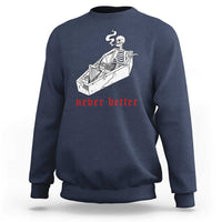 Navy skeleton graphic sweatshirt with coffin illustration and red “never better” text