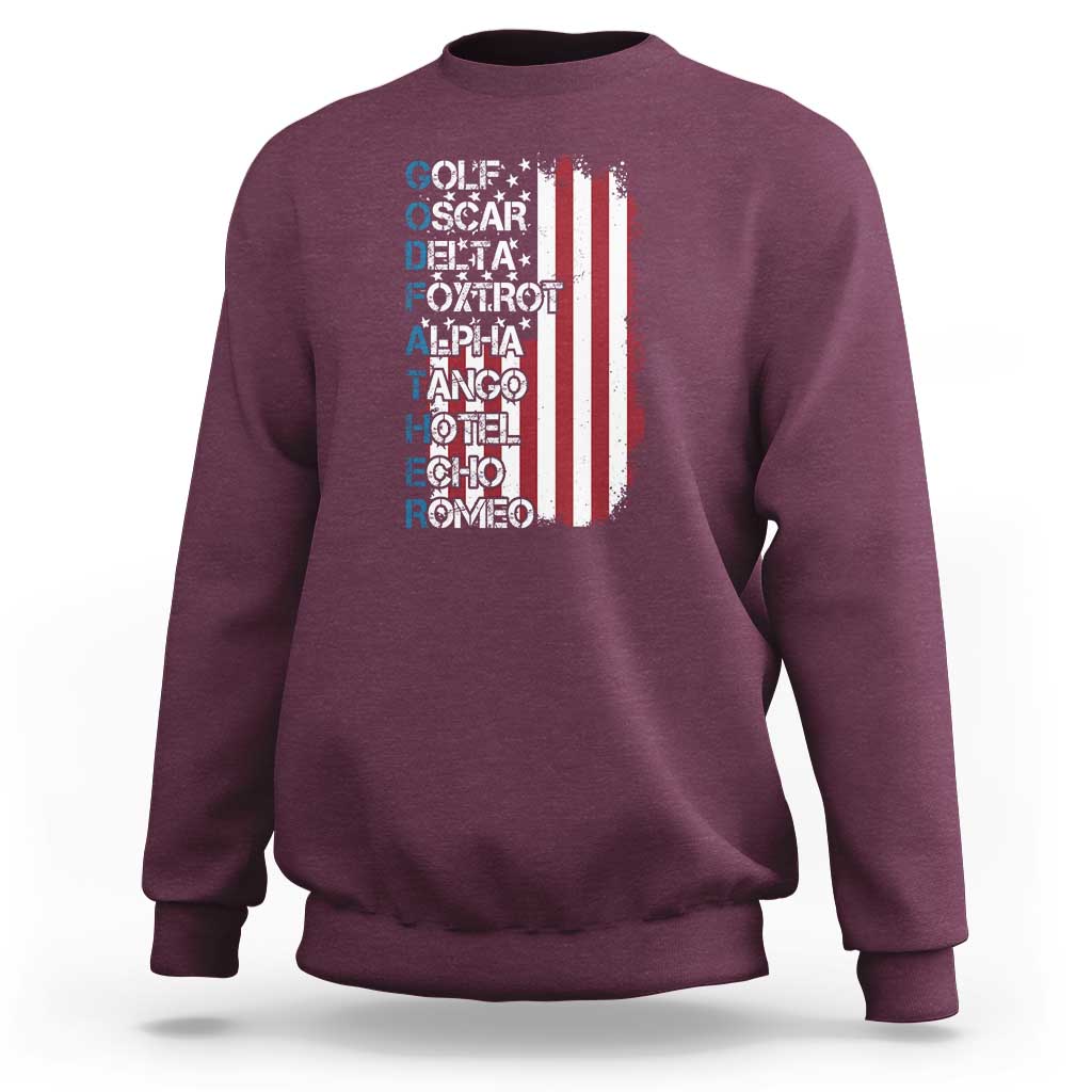 Maroon crewneck sweatshirt with phonetic alphabet text and striped shield graphic