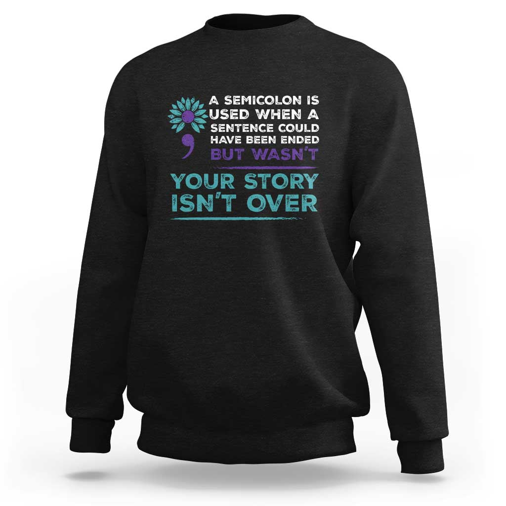 Black crewneck sweatshirt with semicolon awareness quote graphic at chest