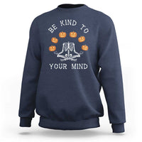 Navy Halloween crewneck sweatshirt with skeleton pumpkin mind graphic on back