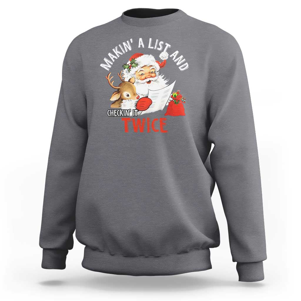 Dark heather gray Christmas Santa sweatshirt featuring Makin' A List and check twice graphic