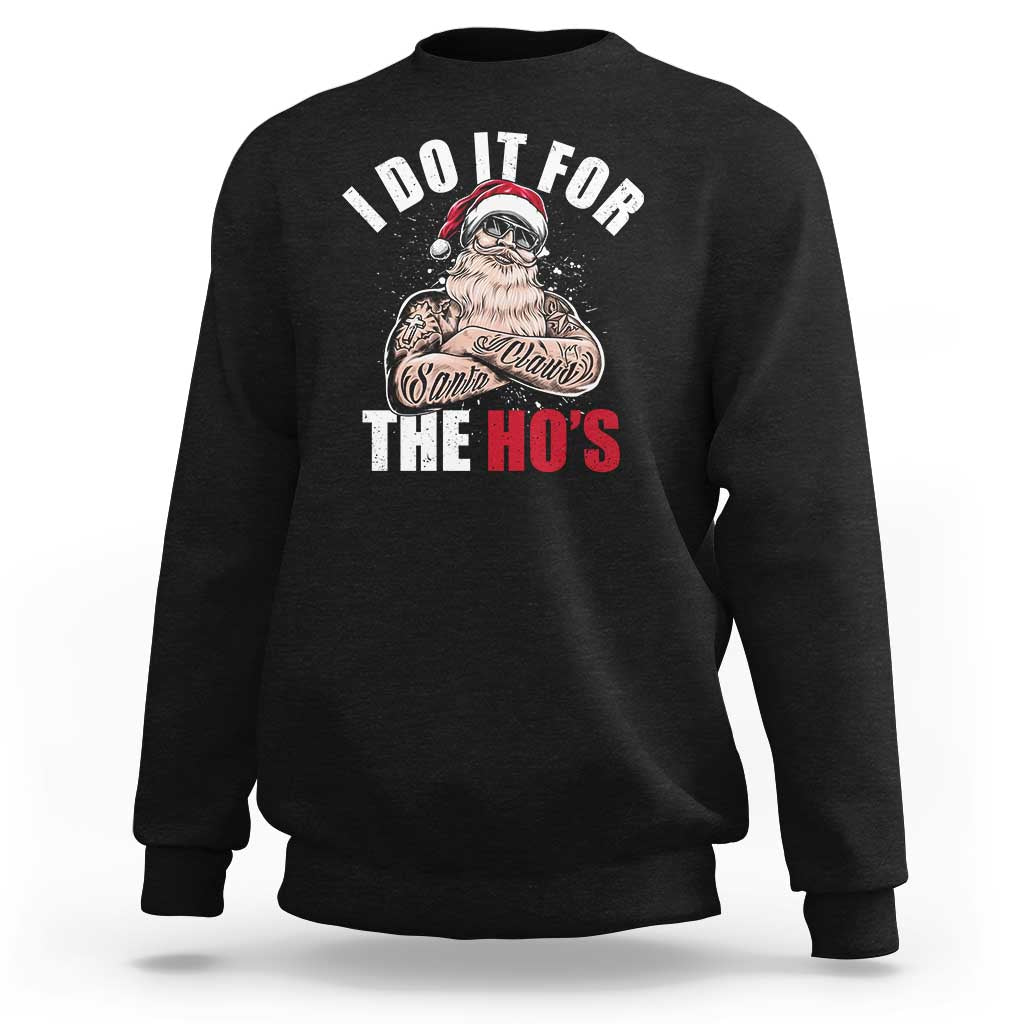 Black Christmas sweatshirt with Santa graphic and 'THE HO'S' text on chest