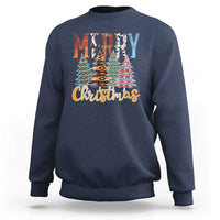 Navy crewneck sweatshirt with 'Merry Christmas' and multicolor tree graphic.
