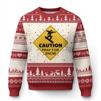 Ugly Christmas sweater in red and cream with snowy border and yellow caution pray for snow