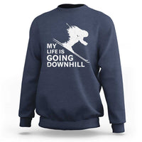 Navy skiing sweatshirt with white skier graphic and slogan "My life is going downhill".