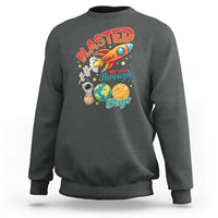 Dark heather gray crewneck sweatshirt with colorful space graphic on the back