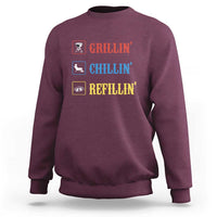 Purple sweatshirt with 'GRILLIN'', 'CHILLIN'', 'REFILLIN'' grill graphic