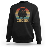 Black crewneck sweatshirt with cat graphic and 'CHONK' text