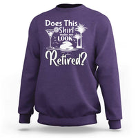 Purple crewneck sweatshirt with 'Retired?' graphic on chest