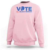Light pink sweatshirt with VOTE graphic and “like a BLACK WOMAN” text on chest