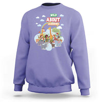 Violet crewneck sweatshirt with colorful zoo animal graphic on front