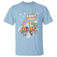 Light blue crewneck T-shirt with “Wild About Learning” jungle animal graphic