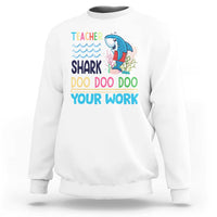 White crewneck sweatshirt with teacher shark 'Doo Doo Doo Your Work' graphic