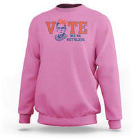Azalea pink women's crewneck sweatshirt with 'VOTE' and 'WE'RE RUTHLESS' chest graphic.
