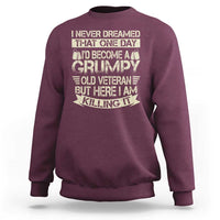 Maroon sweatshirt with large back graphic and ribbed crew neck cuffs