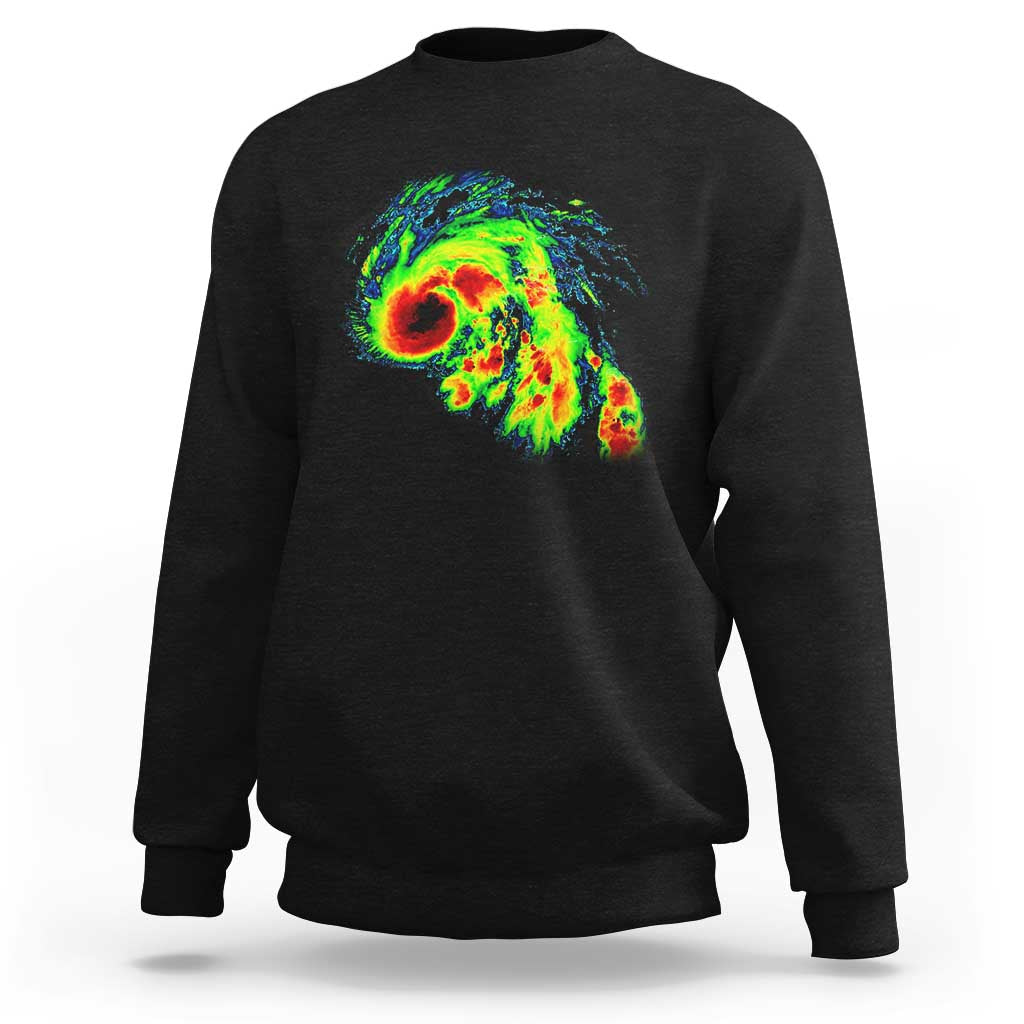 Black crewneck sweatshirt with large colorful storm radar graphic on the back
