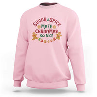 Light pink Christmas sweatshirt with “Sugar & Spice Make Christmas So Nice” graphic