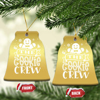 Gold tree-shaped ornament with hanging loop and “THE COOKIE CREW” text