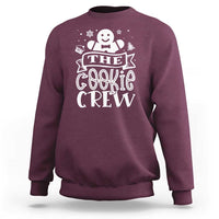 Maroon crewneck sweatshirt with white “The Cookie Crew” cookie graphic