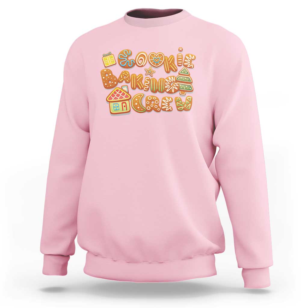 Light pink crewneck sweatshirt with colorful gingerbread cookie holiday graphic