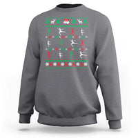 Charcoal gray crewneck sweatshirt, back graphic of ice skaters in festive colors
