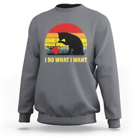 Charcoal gray sweatshirt with cat sunset design and “I DO WHAT I WANT” text