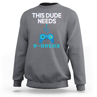 Gray crewneck sweatshirt with “THIS DUDE NEEDS” gaming controller graphic and V-BUCKS text