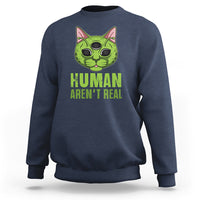 Navy crewneck sweatshirt with alien cat graphic and "HUMAN AREN'T REAL" print