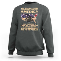 Charcoal gray crewneck sweatshirt with America map graphic and slogan print on back.