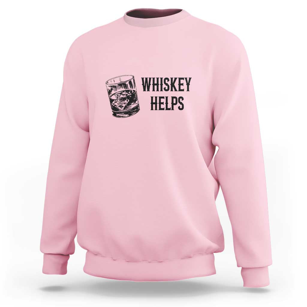 Light pink crewneck sweatshirt with “WHISKEY HELPS” graphic and cup icon.