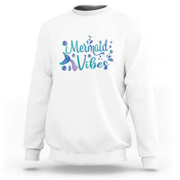 White crewneck sweatshirt with mermaid tail graphic and “Mermaid Vibes” print
