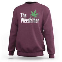 Men's maroon crewneck sweatshirt with green 'Weedfather' marijuana leaf graphic