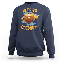 Blue sweatshirt with “LET’S GO COCONUT!” graphic and smiling coconut mascot