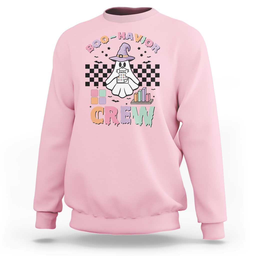 Light pink crewneck Halloween sweatshirt with ghost-witch 'Boo-Havior Crew' print