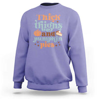 Violet sweatshirt with 'Thick Thighs and Pumpkin Pies' graphic, long sleeves