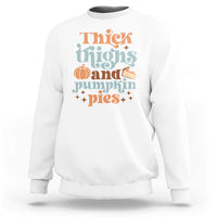 White sweatshirt with 'Thick Thighs and Pumpkin Pies' graphic, long sleeves