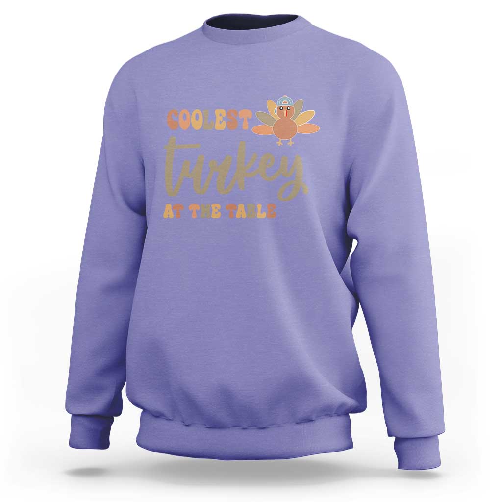 Violet sweatshirt with turkey graphic 'Coolest Turkey at the Table'