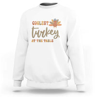 White sweatshirt with turkey graphic 'Coolest Turkey at the Table'