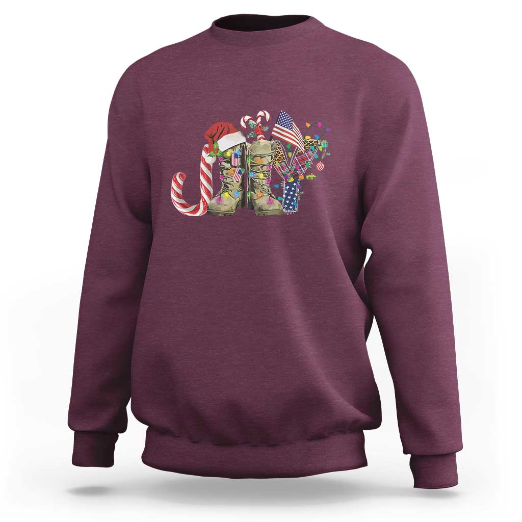 Maroon crewneck sweatshirt with Christmas veterans graphic and candy cane-striped cane