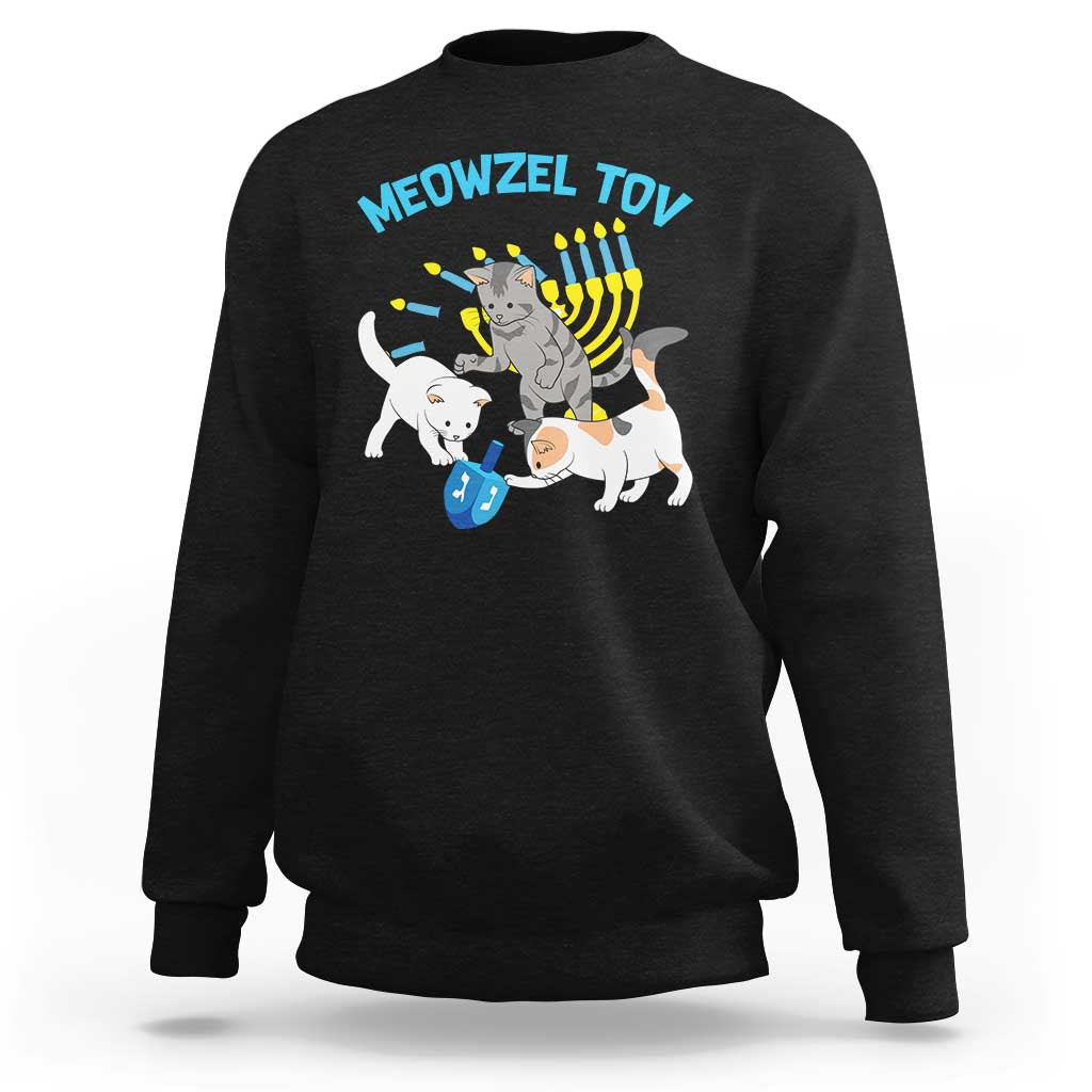 Black cats Hanukkah sweatshirt with MEOWZEL TOV graphic and menorah