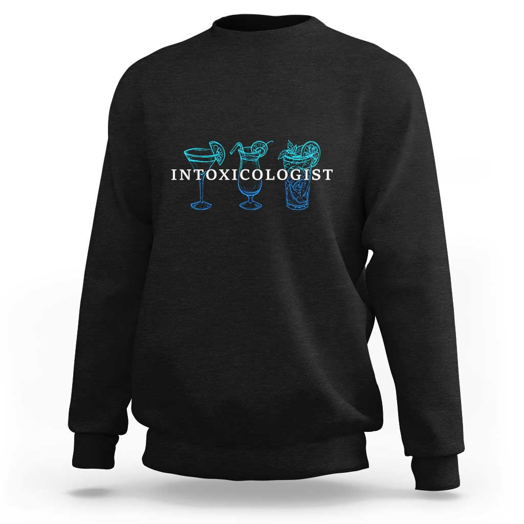 Black crewneck sweatshirt with turquoise 'INTOXICOLOGIST' bar drink graphic