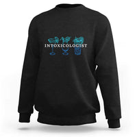 Black crewneck sweatshirt with turquoise 'INTOXICOLOGIST' bar drink graphic